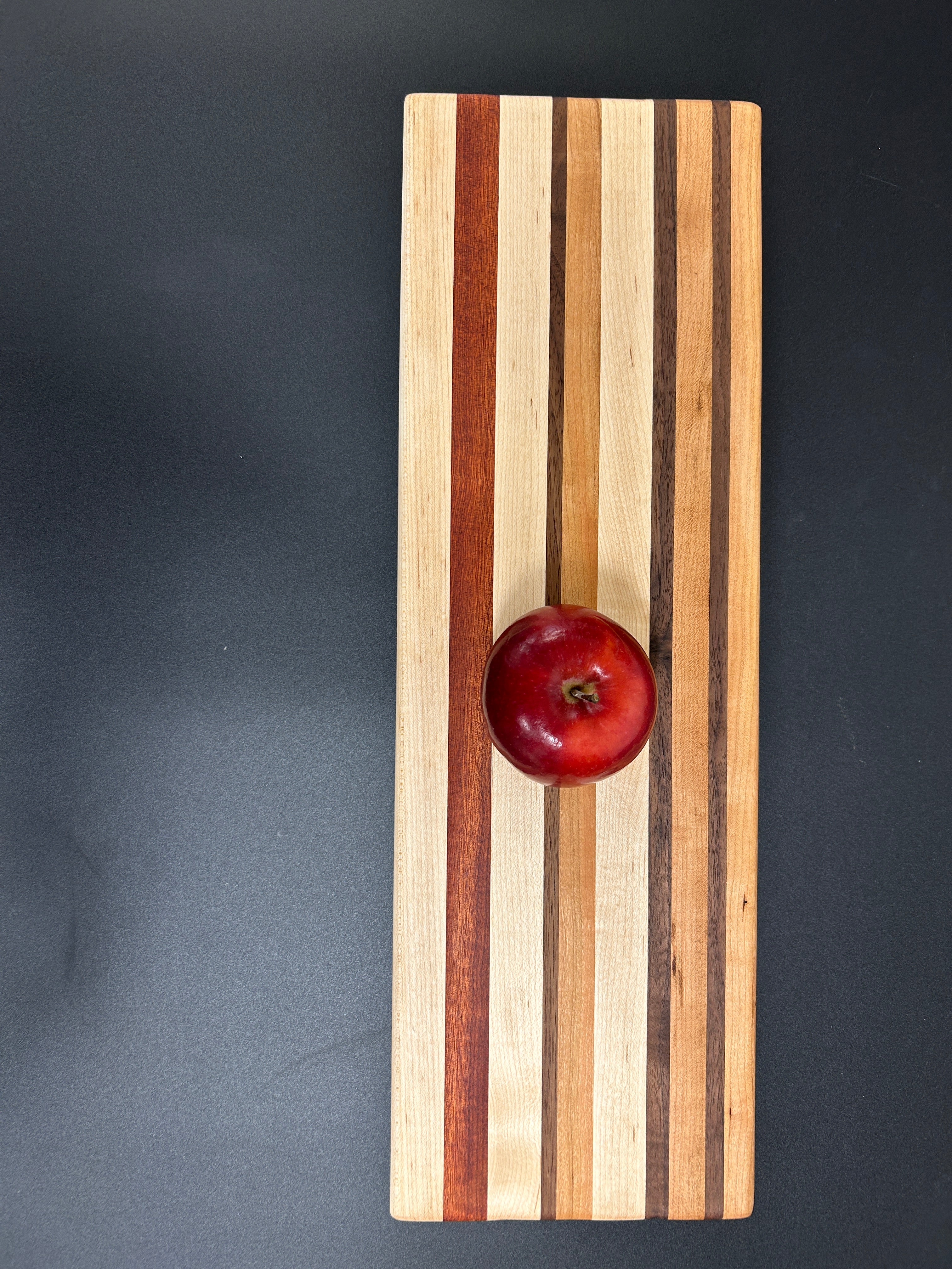 Warm-Toned Hardwood Serving Board with Vertical Stripes - 9 x 24.5 x 0.75