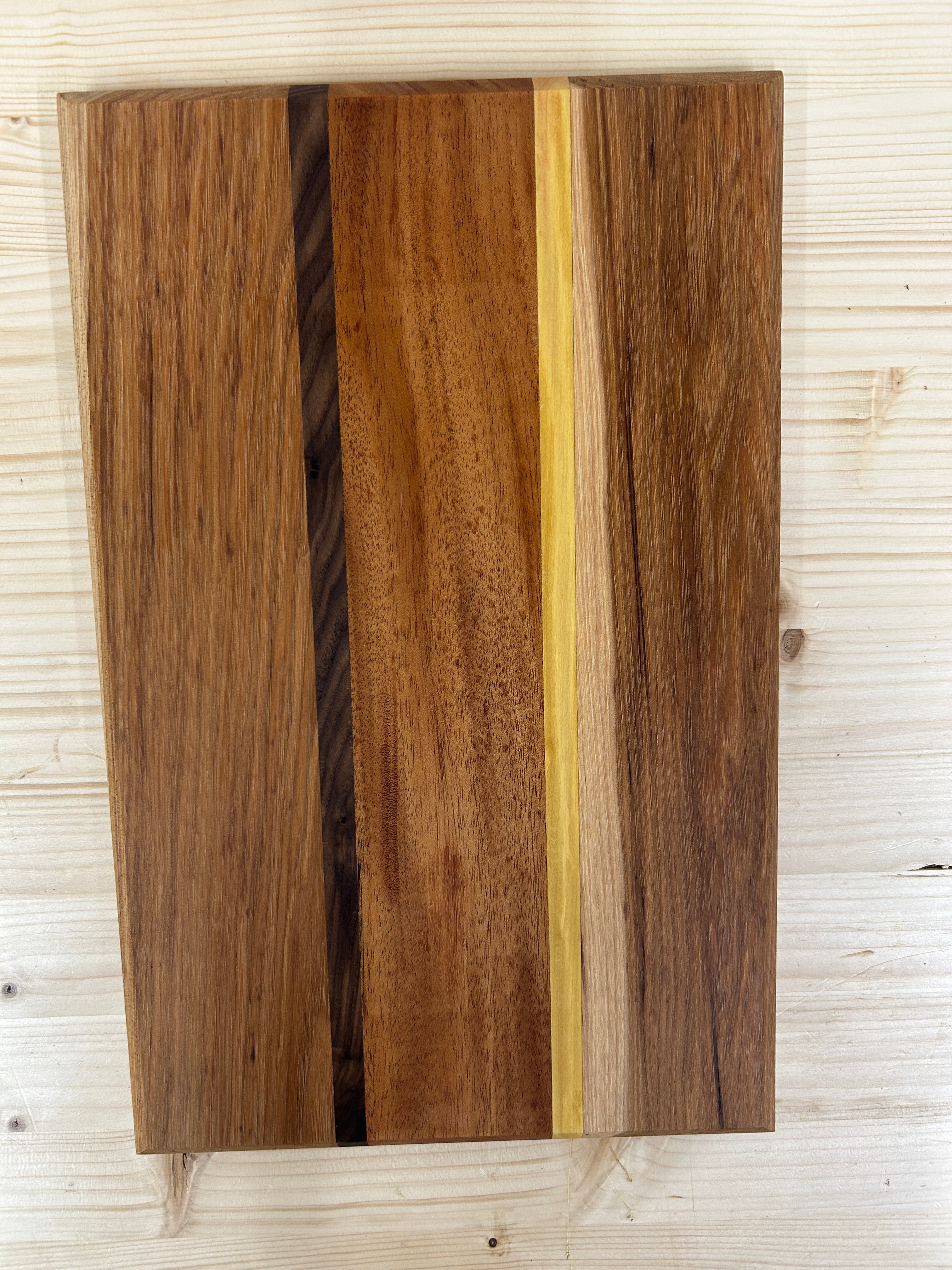 Handcrafted Mixed Hardwood Cutting Board with Accent Stripe